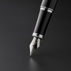 Parker − Stylo à bille IM − laqué noir avec bordure chromée − pointe fine − encre noire-Une forme confortable et ergonomique associée au savoir-faire PARKER de qualité supérieure pour évoquer le riche héritage de la marque