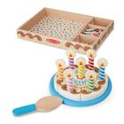 Gâteau d'anniversaire Melissa & Doug -Les languettes Velcro maintiennent les pièces ensemble, puis les « découpent »