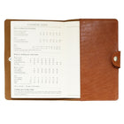 Ashlin ? Carnet Porchia de taille moyenne avec fermeture à pression, havane (P9088-18-08)-Le journal est doté de pages lignées ivoire et de bords dorés.