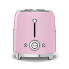 SMEG - Toasteur Rétro À 2 Tranches - Rose-Nettoyer l'intérieur du grille-pain est plus facile grâce au tiroir à miettes.