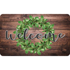 Ashley Productions - The Original Fun Mat - Tapis de Bienvenue - 18" x 30" - Couronne Verte sur Bois de Bienvenue-Mesures et design : La couronne verte sur le paillasson en bois mesure 18 po x 30 po.