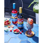 Torani - Sirop framboise bleu sans sucre -750 mL - paquet de 4-Plus que simple café : déal pour les lattes, les frappes, les thés, les sodas artisanaux, les limonades, les milkshakes, les desserts et autres boissons mélangées congelées