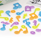 Miniland - MLE97901 Compteurs musicaux translucides-96 figures musicales et 1 portée transparente