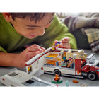 LEGO - City Great Vehicles Holiday Adventure Camper Van - 385 pièces-L'intérieur du camping-car comprend une cuisine, des toilettes, un berceau, 2 lits superposés et un ensemble de repas