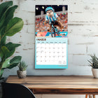 BrownTrout - 2026 Otter Olympics Calendrier mural Suspendu Mensuel - 30,5 cm l x 61 cm H - Anglais-Caractéristiques - 16 mois (mise en page sur deux pages de septembre à décembre 2025 et de janvier à décembre 2026) , 30,5 cm x 30,5 cm (fermé) , 30,5 cm x 60,9 cm (ouvert) , 28 pages