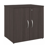 Bush Business Furniture - Studio C Armoire de rangement de bureau avec portes, gris tempête (SCS130SG)-La finition stratifiée thermofusionnée durable protège des rayures et des taches pour protéger l'armoire de rangement du bureau