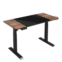 LjubLjana - Bureau assis-debout à hauteur réglable électrique de 47 po - Noir/Bois-Conception robuste en 4 parties - Cette table peu encombrante de 47,2 po x 23,6 po s'intégrera facilement dans votre espace de bureau tout en offrant suffisamment d'espace pour une variété de configurations de moniteurs et d'ordinateurs portables ainsi que des matériaux de travail importants, des fournitures, et décor