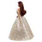 Mattel - Poupée Barbie Joyeux Noël 2025 - cheveux brun avec une robe argent et or-La robe se distingue par une jupe ample et volumineuse avec un col sans bretelles à volants, tandis que ses boucles d'oreilles dorées ajoutent plus d'élégance de vacances !