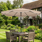 Outsunny - Parasol rond de marché avec cantonnière - 9 pi x 9 pi - kaki-Une ouverture supérieure favorise la circulation de l'air, renforçant la stabilité de ce parasol lors des journées venteuses
