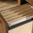 Sauder 59"W La Collection Carson Forge Bureau - Finition Washington Cherry-  L'espace de rangement derrière la porte dispose d'une étagère réglable et peut contenir une tour CPU
