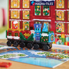 Magna-Tiles - Ensemble de construction magnétique Calendrier de l’Avent 34 pièces -Sécurité garantie: Toutes les pièces MAGNA-TILES sont conçues pour résister à d’innombrables heures de jeu. Notre grille exclusive empêche la fissuration, tandis que les rivets de fixation maintiennent les aimants en sécurité