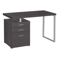 Monarch Specialties - 7426 Bureau 48 po L - Gris Orientation Gauche Ou Droite-Un bureau d'ordinateur moderne de 48 pouces de long dans un style moderne, avec une configuration réversible pour une installation à gauche ou à droite, parfait pour créer un espace de travail fonctionnel dans votre bureau à domicile.