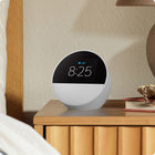Amazon - Réveil intelligent Echo Spot (2024) - Blanc glacier-GARDER VOTRE FOYER COMFORTABLE : contrôlez vos appareils intelligents compatibles. Demandez à Alexa d'allumer les lumières ou touchez l'écran pour les tamiser. Créez des routines activées par le mouvement pour baisser le thermostat lorsque vous quittez votre domicile ou pour ouvrir les stores quand vous entrez dans une pièce.