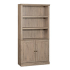 Sauder - Bibliothèque à 5 étagères - Chêne laurier-Rangement multi-pièces: cette bibliothèque fonctionnelle à portes peut répondre à vos besoins de rangement dans différentes pièces: salon, bureau, cuisine, atelier ou salle de bain