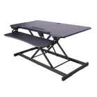 Rocelco - Bureau réglable électrique de 46 po avec CA/USB et tapis antifatigue - Noir-Œillet arrière pour bras de moniteur en option