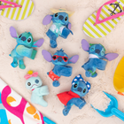 Excell Brands - Stitch les Cutie Cuffs-Fabriqués dans un tissu ultra-doux, les Cutie Cuffs sont conçus pour être portés au poignet ou accrochés à un sac à dos, à une bouteille d'eau ou à d'autres objets pour leur donner un petit air mignon