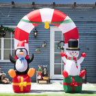 Outsunny - Arche gonflable de bonbons de Noël de 9' avec pingouin - bonhomme de neige - boîte cadeau LED - Blanc-Comprend huit piquets et quatre cordons de serrage pour le maintenir ancré lors des nuits venteuses 