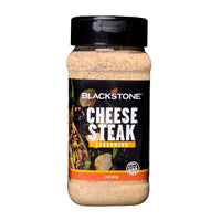 Blackstone - Assaisonnement pour cheesesteak-Sel, oignon, ail et poivron déshydratés, maltodextrine, lactosérum, sucre, arômes naturels (contient du lait), protéine de soya hydrolysée, paprika, épices, inosinate disodique, guanylate disodique et au plus 2 % de phosphate tricalcique ajouté pour prévenir l’agglomération