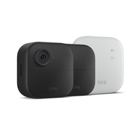 Amazon - Blink Outdoor 4 XR - 2 caméras avec module de synchronisation XR-Blink Sync Module XR est le premier hub système à étendre la portée de vos caméras de sécurité intelligentes sans fil Blink Outdoor 4 (jusqu'à deux) afin que vous puissiez voir facilement ce qui se passe autour de toute votre propriété.