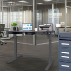 Motionwise - Bureau ergonomique électrique assis-debout à moteur unique série M1 Glass - Frêne-Durabilité et stabilité premium : Conçu avec un plateau en verre (trempé) raffiné et un cadre en acier enduit de poudre, ce bureau allie longévité et allure professionnelle