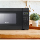 Commercial Chef - Four à micro-ondes de comptoir de 0,9 pi³ et 900 W - Noir-Caractéristiques impressionnantes : En ce qui concerne les fours à micro-ondes de comptoir, notre cuisinière à micro-ondes blanche est supérieure avec 900 watts de puissance, un bouton-poussoir pratique, un rouleau de plateau tournant, un plateau en verre et un guide d'ondes.