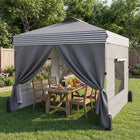 Outsunny - Tente auvent pliante 10 pi l x 10 pi L avec installation facile à 1 bouton - Gris foncé-Huit trous de drainage sur cette tente empêchent l'accumulation d'eau de pluie