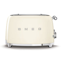 SMEG - Toaster 4 tranches 4x4 - Crème-6 niveaux de grillage différents pour de meilleurs résultats ; fonction de décongélation ; fonction de réchauffage ; fonction bagel pour griller uniquement un côté de la tranche.