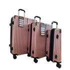 TRAVLR - Valise d'enregistrement légère à coque rigide, 24 po - Or Rose-Pieds latéraux pour assurer la stabilité et la résistance aux chocs
