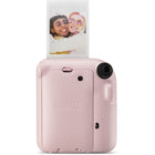 FujiFilm - Appareil instantané Instax Mini 12 - Fleur rose-Il suffit de tourner l'objectif pour allumer et éteindre l'appareil