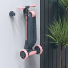 Yvolution - Yglider Nua Trottinette - Rose-Dites adieu aux espaces encombrés et profitez du confort grâce à l'emplacement unique pour accessoires du Y Glider Nua. Accrochez-le au mur ou rangez-le derrière une porte pour un rangement simple et un gain de place.