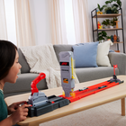 Hot Wheels - Coffret Piste Grille de Départ Formule 1-Placez deux voitures dans les lanceurs, relevez le levier de la tour de départ et concentrez-vous sur le compte à rebours, puis appuyez sur les boutons pour lancer la course