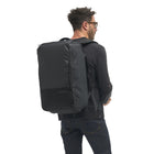 Nomatic - Sac de voyage de 40 L - noir- Poches dédiées aux essentiels de voyage (passeports, bouteilles d'eau, etc.)