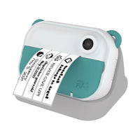 myFirst - Camera Insta Wi Appareil photo instantané pour enfants, imprimante d’étiquettes - Sarcelle​-La myFirst Camera Insta Wi prend en charge l’impression thermique instantanée en 10 secondes (pas d’encre nécessaire grâce à une technologie avancée), chaque rouleau de papier thermique imprimant jusqu’à 50 images . le pack comprend 3 types d’autocollants/papier thermique et 5 rouleaux au total de papier/autocollants thermique, ainsi que des autocollants décoratifs pour un usage ludique