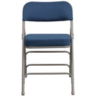 Chaise pliante Premium de la série HERCULES en métal et tissu marine à triple entretoise courbé et double charnière-Ensemble de 4 chaises pliantes en métal et rembourrées