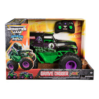 Monster Jam - Voiture télécommandée Grave Digger Smash & Bash-Smash & Bash Grave Digger radiocommandé : Ce monster truck radiocommandé à l'échelle 1:15 arbore le style authentique de Grave Digger et un design robuste, et est doté de pneus en caoutchouc souple pour un jeu plus vrai que nature