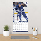 DateWorks - 2026 Calendrier Mural 16 Mois - 12 po x 12 po - Maple Leafs de Toronto - Bilingue -Comprend des pages mensuelles de janvier à décembre 2026, ainsi que les 4 derniers mois de 2025