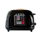 Uncanny Brands - Grille-pain Elite - Dark Vador-La plaque de poitrine emblématique de Vader en couleur sur le devant.

