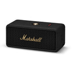 Marshall - Emberton III Enceinte Bluetooth portable et étanche - Noir et Laiton-L’Emberton III de Marshall incarne l’esprit de la route, avec une robustesse qui se moque de la poussière et de la plui