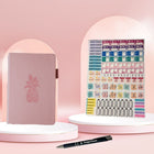 Wamaco - Collection Pineapple Planning Essential - Agenda rose non daté, autocollants, stylo-Professionnel - Notre collection Planner Essentials ajoute une touche esthétique à toutes ses utilisations. Le stylo à bille écrit en douceur et les autocollants permettent d'attirer l'attention sur les jours et les engagements importants.