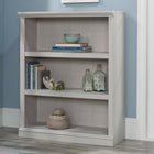 Sauder - La Collection Sauder Select Bibliothèque - Finition Glacier Oak-Assemblage rapide et facile grâce aux moulures glissées brevetées.