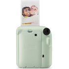 FujiFilm - Appareil instantané Instax Mini 12 - Menthe verte-Il suffit de tourner l'objectif pour allumer et éteindre l'appareil