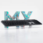 Clavier éclairé sans fil avancé pour Mac Logitech MX Keys - Gris cosmique-Rationnalisez le flux de travail entre les ordinateurs. MX Keys pour Mac suit les souris compatibles Flow de l’iPad à l’ordinateur pour taper, copier et coller aisément