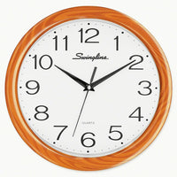 Swingline – Horloge murale ronde de 12 po, grain de bois-Idéale pour tous les décors, cette horloge murale de 12 po au style fonctionnel affiche un fini stylé en faux-bois qui accentue tout décor traditionnel ou moderne