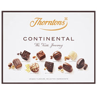 Thorntons - Continental Milk - Assortiment de chocolats noirs et blancs - 264g-La selection continentale contient de la mousse sicilienne, de la tranche de noisette, du caramel de Seville, du milano noisette, de l'espresso, du praline caramel sale, du luxe viennois, de la truffe viennoise, du praline Alpini et du giandujot.
