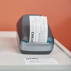 DYMO - LabelWriter sans fil - noir-Contenu de la boîte : Imprimante pour étiquettes LabelWriter sans fil, étiquettes d'adresse - rouleau de départ, DYMO Stamps - rouleau de départ, adaptateur et câble d'alimentation, câble USB et guide de démarrage rapide