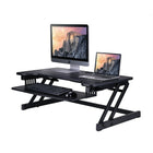 Rocelco – Plateforme surélevée de luxe pour bureau assis/debout, extra-large à hauteur réglable, 37 po, noir -GRANDE SURFACE DE TRAVAIL: Le bureau de 37.5" de large sur 20.5" de profondeur peut contenir jusqu'à deux moniteurs de 32" et le plateau de clavier rétractable de 29" de large sur 11.5" de profondeur peut contenir un ordinateur portable si nécessaire
