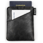 PKG Perry Porte-passeport RFID - Noir-Extérieur en similicuir noir avec un intérieur en tissu 210D noir/blanc