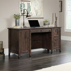 Sauder 59"W La Collection Carson Forge Bureau - Finition Coffee Oak-  Le tiroir inférieur sur glissières à extension complète peut contenir des fichiers suspendus de format Lettre ou Légal