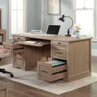 Sauder - La Collection Rollingwood Bureau Ministre - Finition Brushed Oak-Dessus durable de 1 po. d'epaisseur.