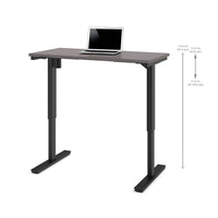 Bestar – Table motorisée à hauteur réglable, 24 po x 48 po, ardoise (65857-59)-Surface de travail robuste en mélamine de qualité commerciale de 1 po dotée d'un fini résistant aux égratignures, aux taches et aux brûlures.